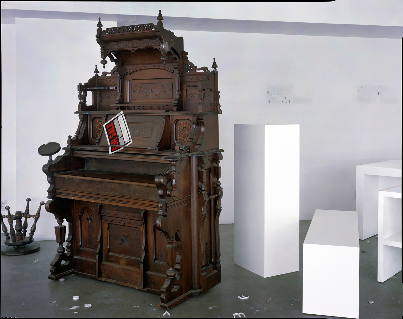 Derelict piano, vacated furniture store, New York City, 2015