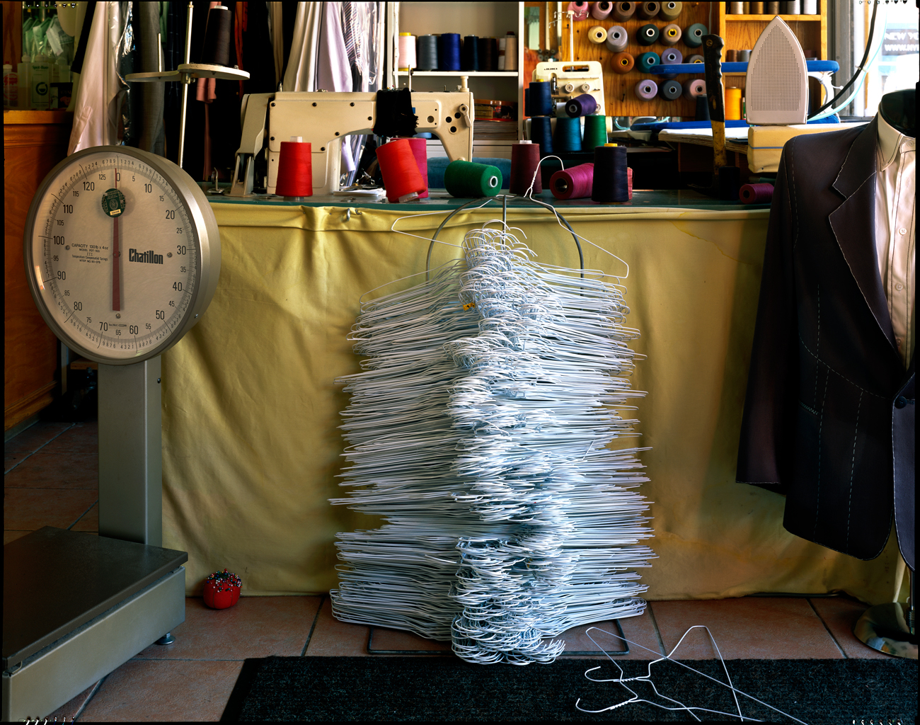 Stacked wire hangars, tailor shop, New York City, 2014